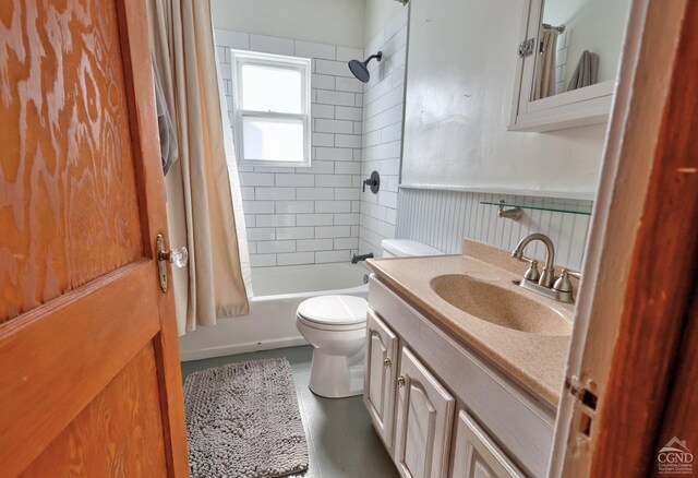 825 Union St, Hudson, NY 12534 - full bath featuring toilet, shower / tub combo with curtain, vanity, and a wainscoted wall