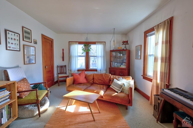 825 Union St, Hudson, NY 12534 - carpeted living room with baseboards