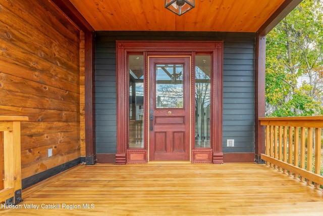 entrance to property with a porch