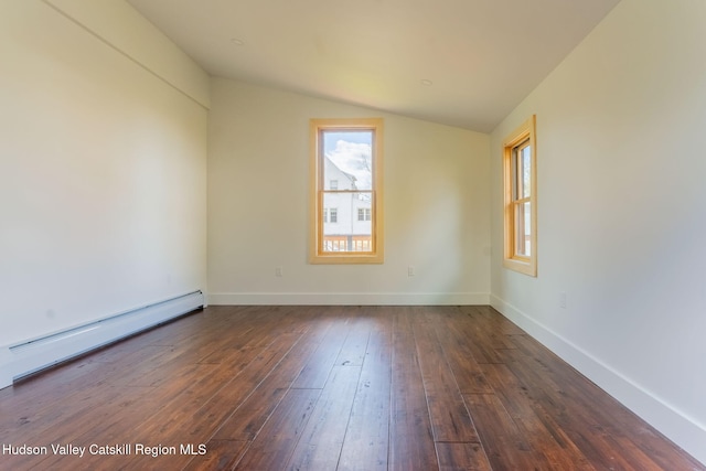 unfurnished room with a baseboard heating unit, lofted ceiling, dark wood finished floors, and baseboards