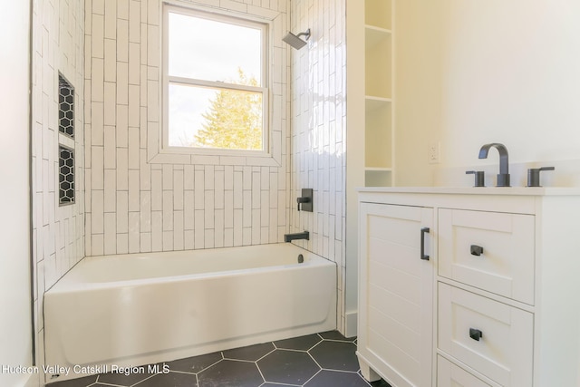 bathroom with shower / bath combination, tile patterned flooring, and vanity