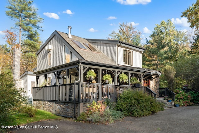 view of home's exterior featuring a porch