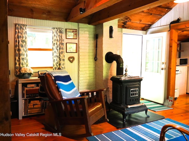 3 Dymond Rd, Kerhonkson, NY 12446 - sitting room with a wood stove, wood finished floors, and wooden ceiling