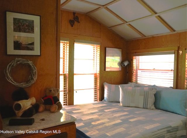 3 Dymond Rd, Kerhonkson, NY 12446 - carpeted bedroom featuring lofted ceiling and wooden walls