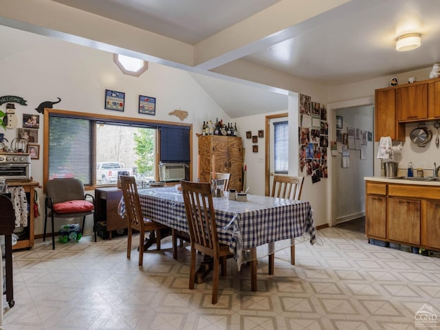 dining space featuring lofted ceiling, light flooring, and cooling unit