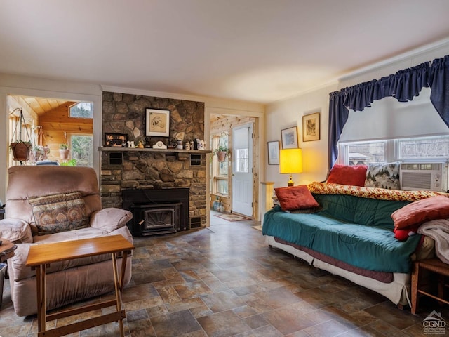 living room with plenty of natural light, dark stone finish flooring, and cooling unit