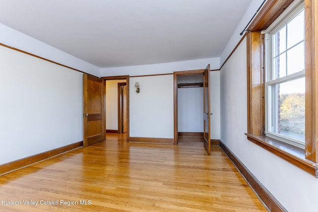 unfurnished bedroom featuring light hardwood / wood-style floors