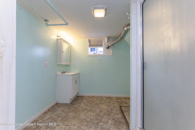 bathroom with vanity and walk in shower
