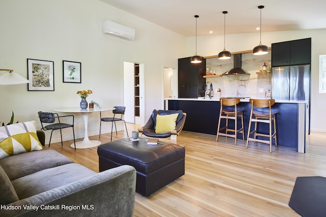 224 Upper Lumber Rd, Lumberland, NY 12737 - living room with a wall mounted air conditioner, light wood-style flooring, a high ceiling, recessed lighting, and bar