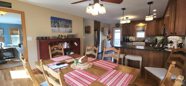 273 E Conesville Rd, Conesville, NY 12076 - dining area featuring ceiling fan and light wood-style flooring