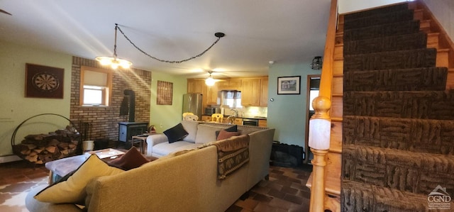 273 E Conesville Rd, Conesville, NY 12076 - living room featuring a wood stove