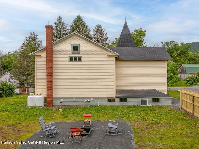 150 Blenheim Hill Rd, Jefferson, NY 12093 - rear view of house featuring a patio and a chimney