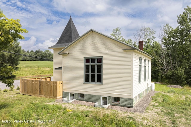 150 Blenheim Hill Rd, Jefferson, NY 12093 - view of home's exterior with a chimney and a yard
