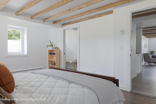 150 Blenheim Hill Rd, Jefferson, NY 12093 - bedroom with baseboard heating, beam ceiling, wood finished floors, and a closet