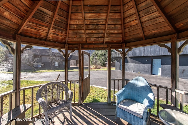 wooden deck with a gazebo