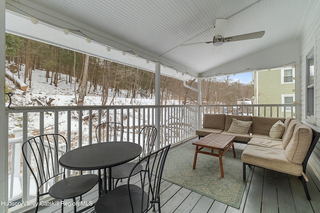 exterior space with ceiling fan and outdoor lounge area