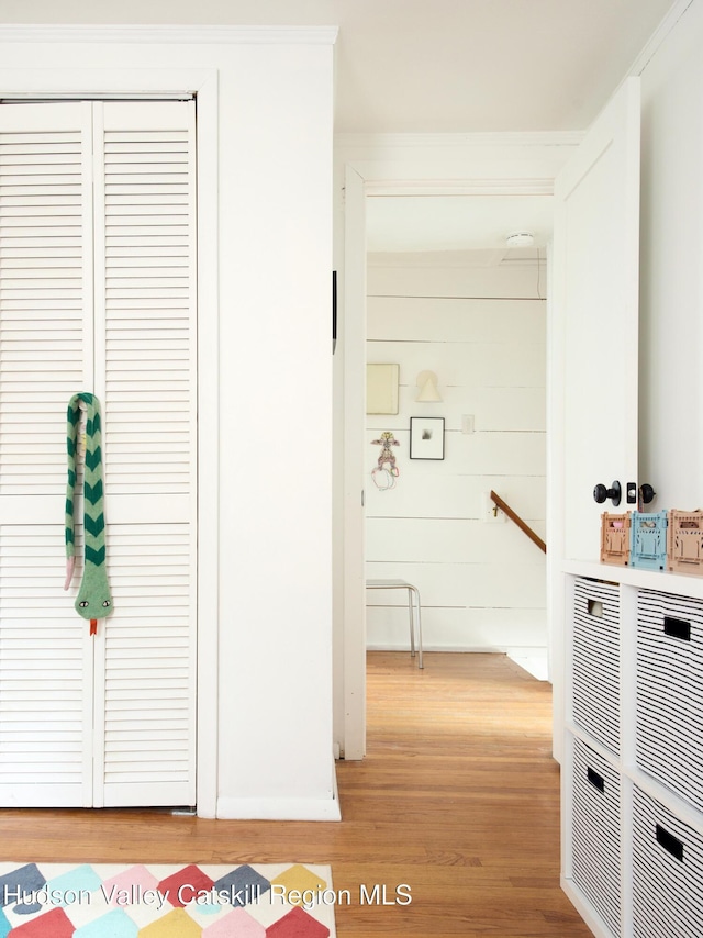 corridor with light wood finished floors
