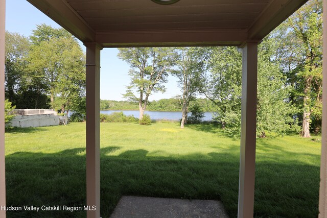view of yard with a water view