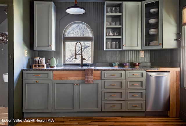 interior space with gray cabinetry and sink