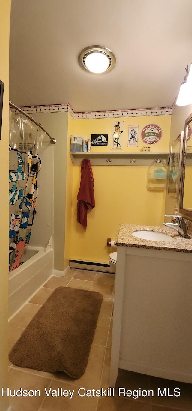 176 Rusk Hollow Rd, Hunter, NY 12442 - full bath with vanity, tile patterned floors, a baseboard radiator, and shower / bath combo