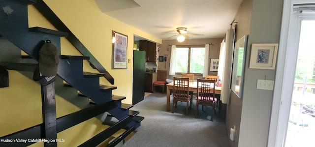 176 Rusk Hollow Rd, Hunter, NY 12442 - dining area featuring a ceiling fan, plenty of natural light, carpet, and stairs