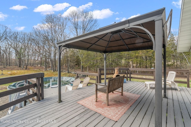 wooden terrace with a gazebo