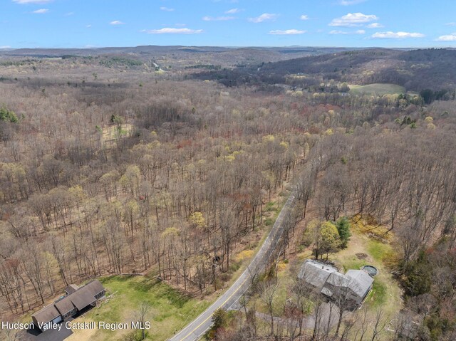 bird's eye view featuring a view of trees