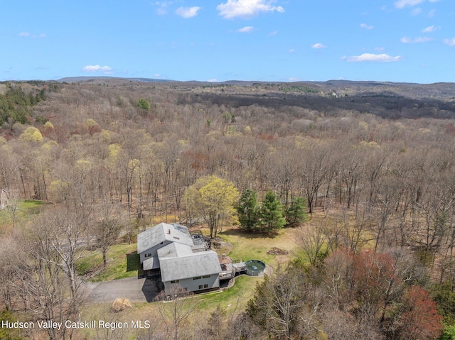 bird's eye view with a view of trees