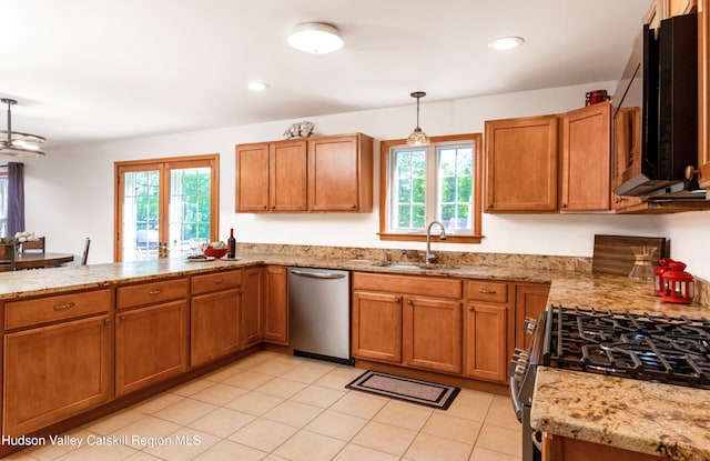 33 Camelot Ct, Saugerties, NY 12477 - kitchen featuring stainless steel appliances, a sink, brown cabinetry, and recessed lighting