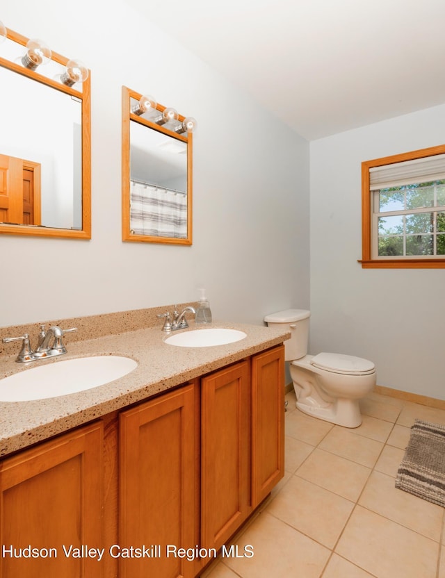 33 Camelot Ct, Saugerties, NY 12477 - bathroom with tile patterned flooring, toilet, and double vanity