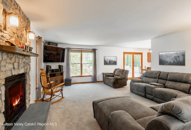 33 Camelot Ct, Saugerties, NY 12477 - carpeted living room with a fireplace