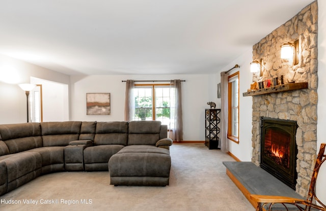 33 Camelot Ct, Saugerties, NY 12477 - living area featuring light colored carpet, a fireplace, and baseboards