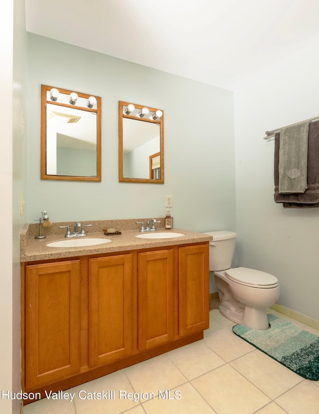 33 Camelot Ct, Saugerties, NY 12477 - bathroom with toilet, double vanity, and tile patterned flooring