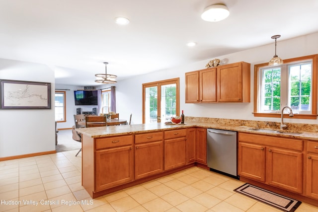 33 Camelot Ct, Saugerties, NY 12477 - kitchen featuring stainless steel dishwasher, a sink, a peninsula, plenty of natural light, and recessed lighting