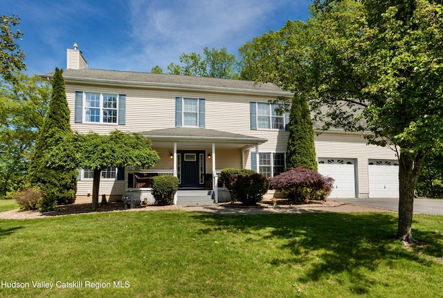 33 Camelot Ct, Saugerties, NY 12477 - view of front of home with concrete driveway, a chimney, covered porch, and a front yard