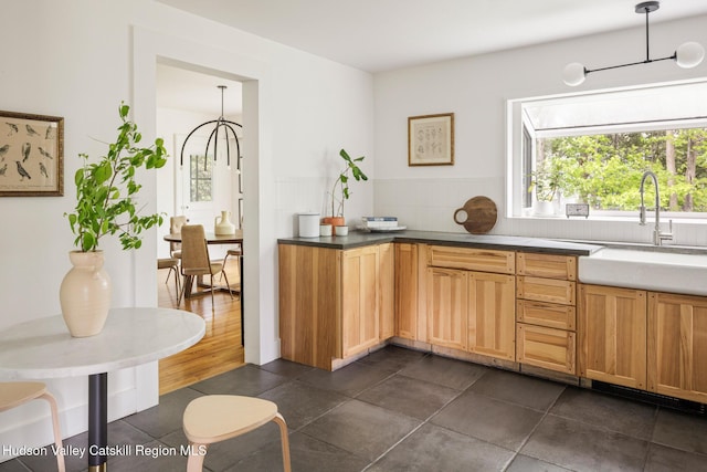 14 Bushnell Ave, Chatham, NY 12037 - kitchen featuring a sink and dark tile patterned flooring