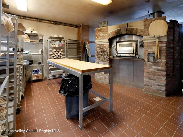 230 Warren St, Hudson, NY 12534 - wine area featuring tile patterned floors