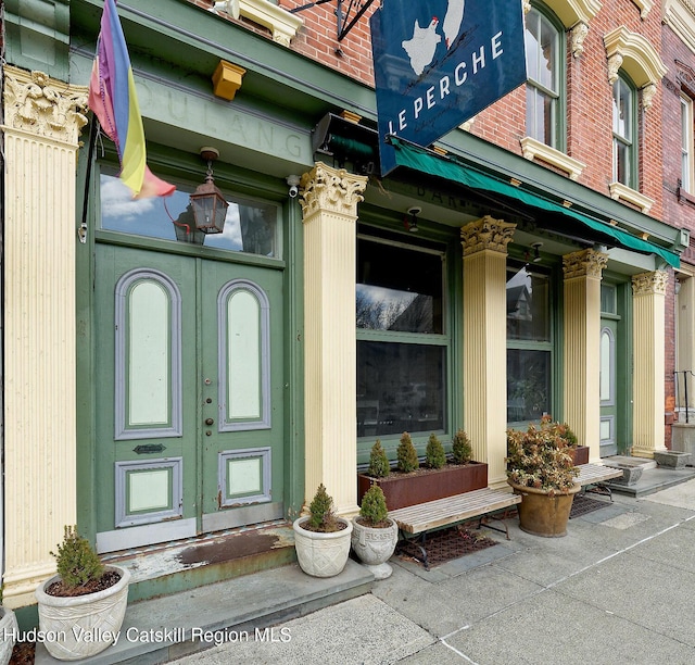 230 Warren St, Hudson, NY 12534 - view of exterior entry with brick siding