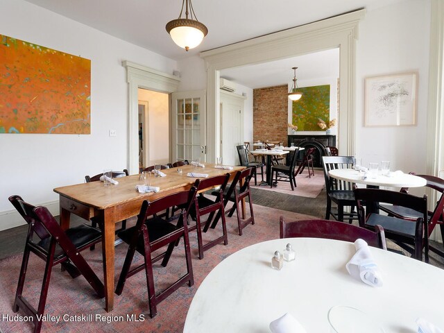 230 Warren St, Hudson, NY 12534 - dining room featuring a wall mounted AC