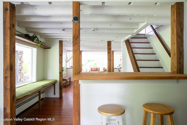 654 Watson Hollow Rd, West Shokan, NY 12494 - interior space with a baseboard radiator, dark wood-type flooring, plenty of natural light, beam ceiling, and stairway