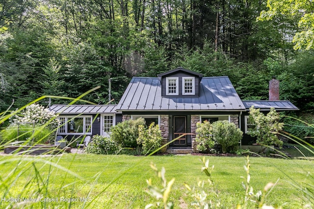 654 Watson Hollow Rd, West Shokan, NY 12494 - view of front facade featuring a standing seam roof, a front yard, a metal roof, and a chimney