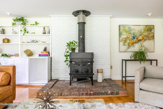 654 Watson Hollow Rd, West Shokan, NY 12494 - living room with wood-type flooring and a wood stove