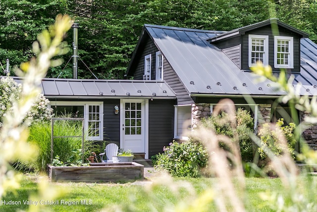 654 Watson Hollow Rd, West Shokan, NY 12494 - rear view of property featuring a standing seam roof, stone siding, and a metal roof
