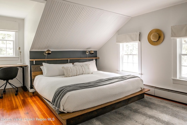 654 Watson Hollow Rd, West Shokan, NY 12494 - bedroom with wood finished floors, lofted ceiling, and a baseboard radiator