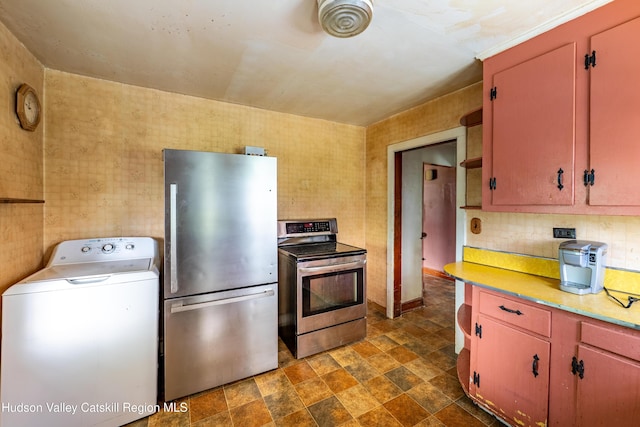 334 Joslen Blvd, Hudson, NY 12534 - kitchen featuring washer / clothes dryer, stainless steel appliances, stone finish floors, light countertops, and backsplash