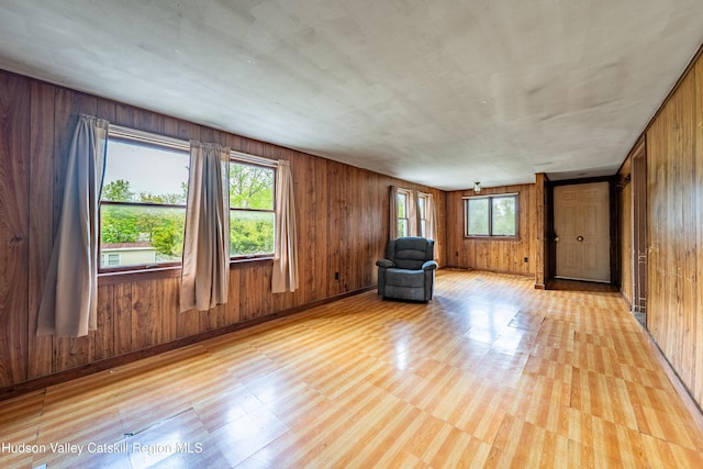 334 Joslen Blvd, Hudson, NY 12534 - unfurnished room featuring wood walls and baseboards