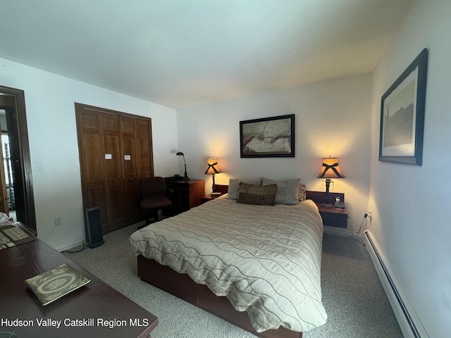 bedroom with light carpet, a baseboard radiator, and a closet