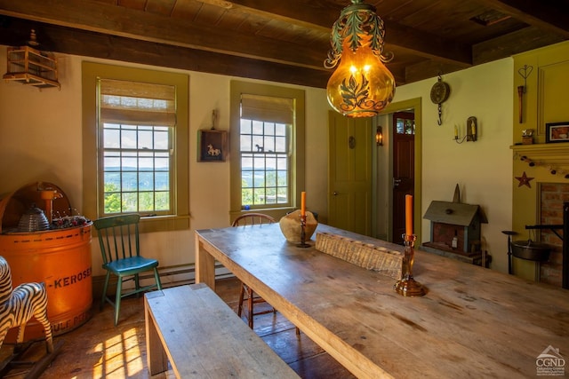 dining room with wooden ceiling and beamed ceiling