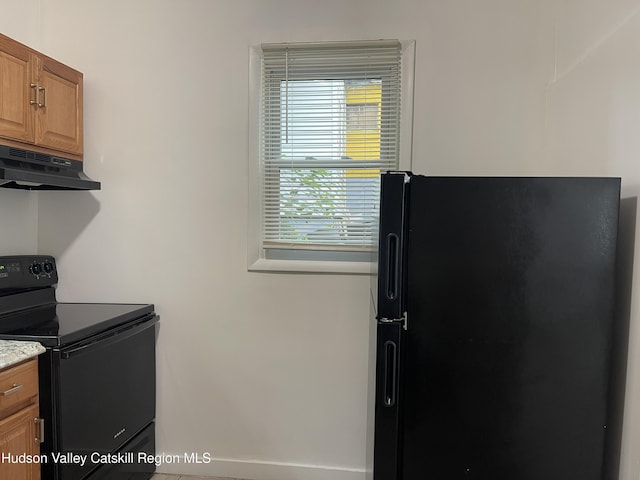 6 Church St, Ellenville, NY 12428 - laundry area featuring baseboards