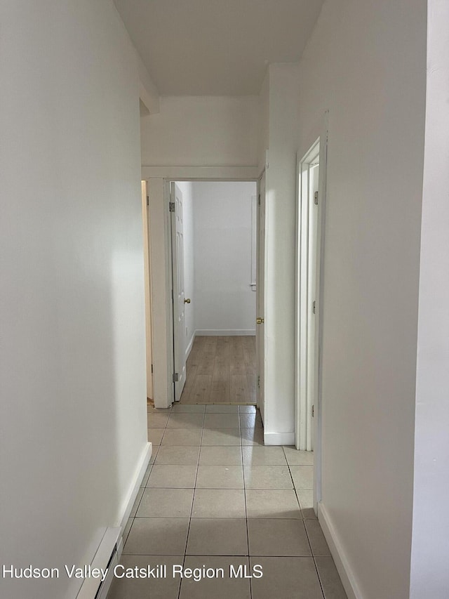 6 Church St, Ellenville, NY 12428 - corridor featuring light tile patterned floors and baseboards